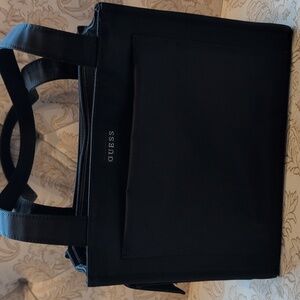 A GUESS black Purse.  Used One Time